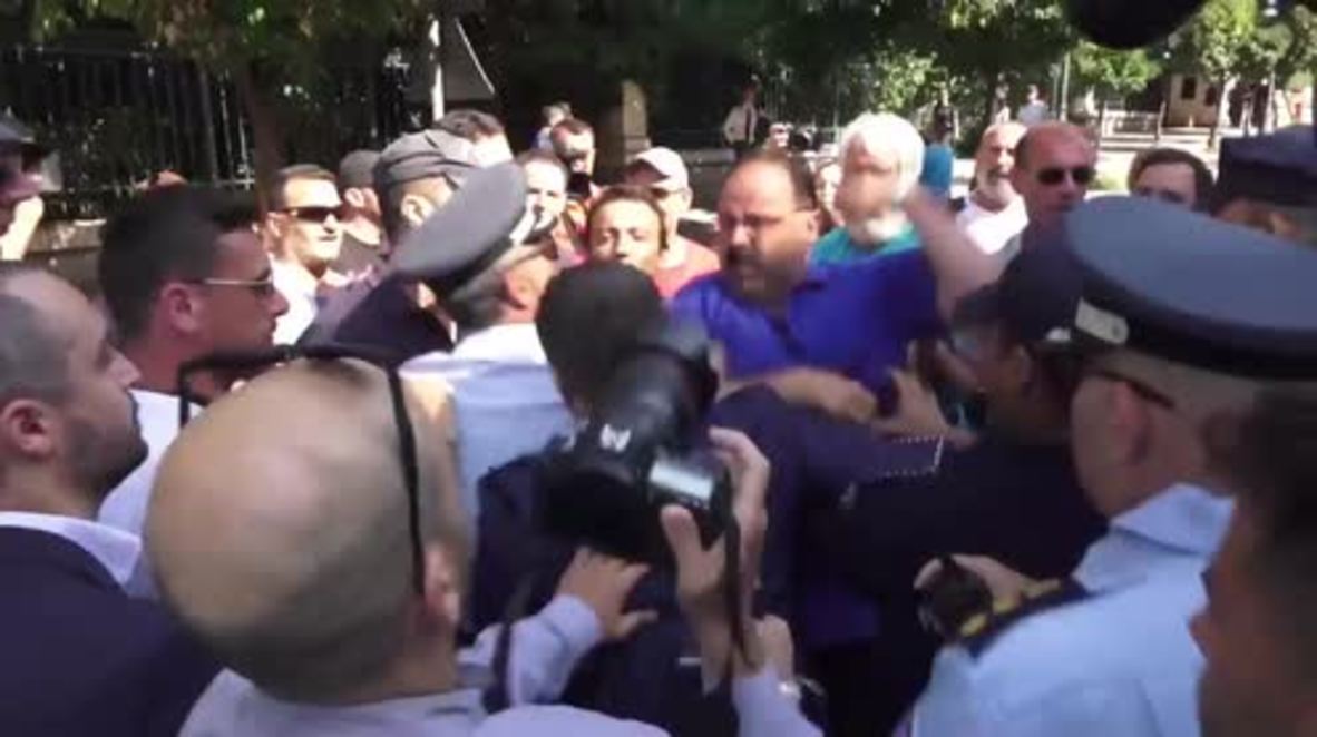 Greece: Police scuffle with protesters outside PM Tsipras’ offices