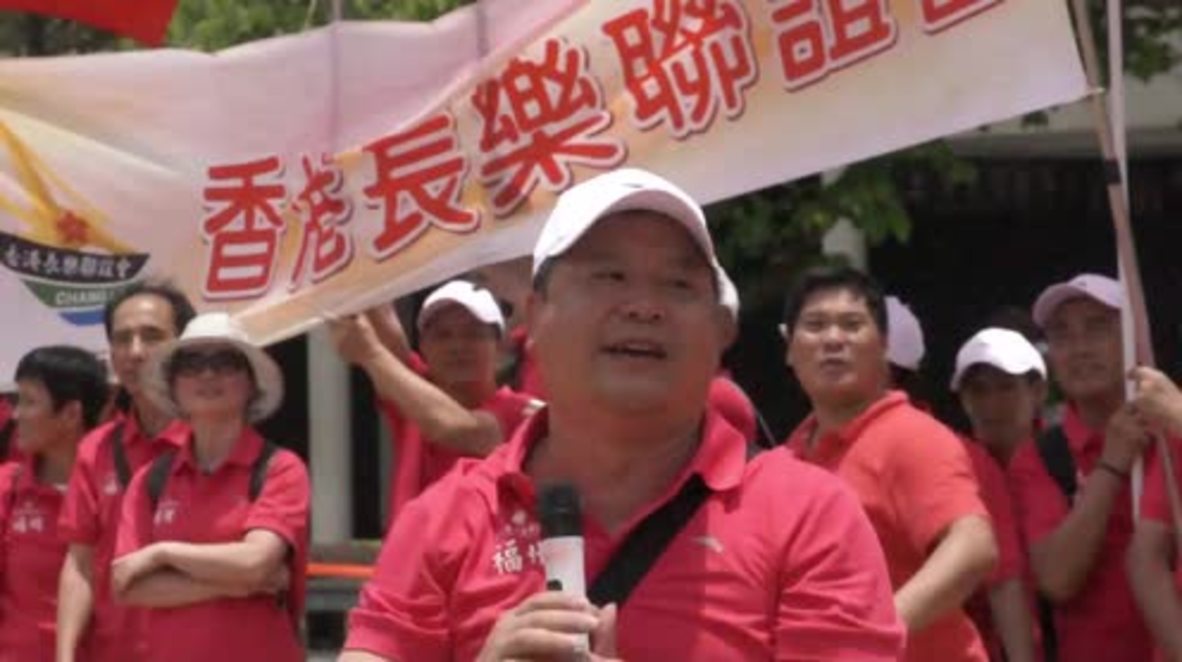 Hong Kong: Chinese patriots celebrate Xi's arrival for handover anniversary