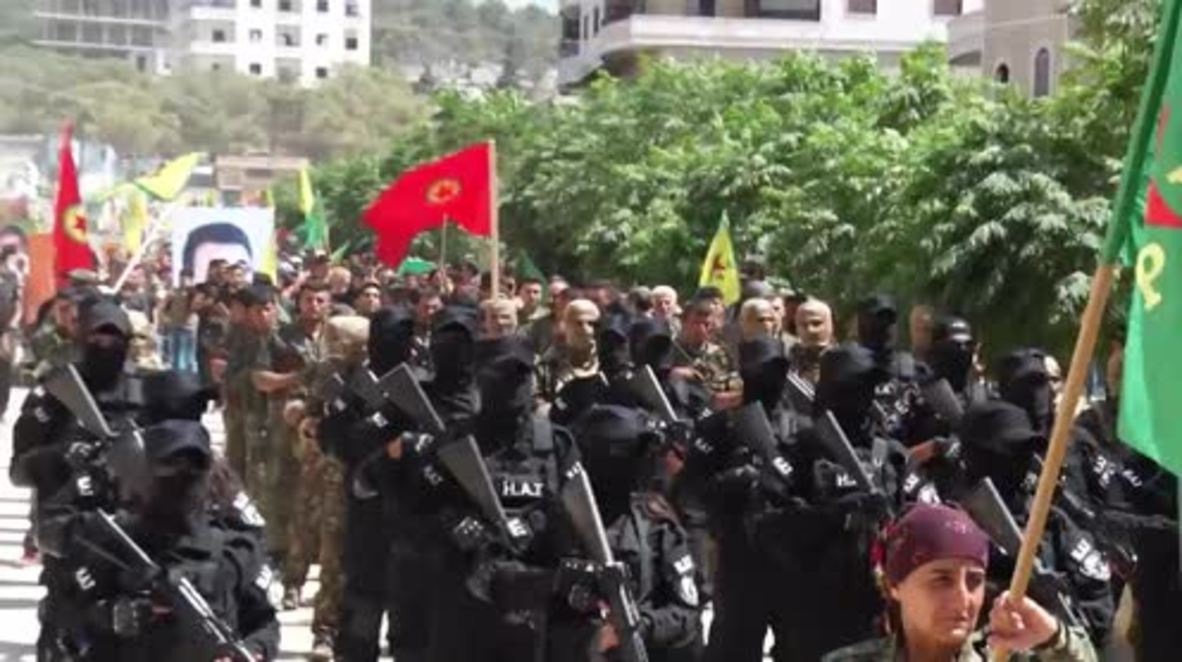 Syria: Rojavan and PKK flags fly as thousands march against Turkish military intervention