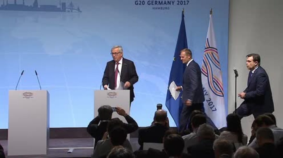 Germany: Juncker warns Trump against protectionism; addresses Hamburg street protests