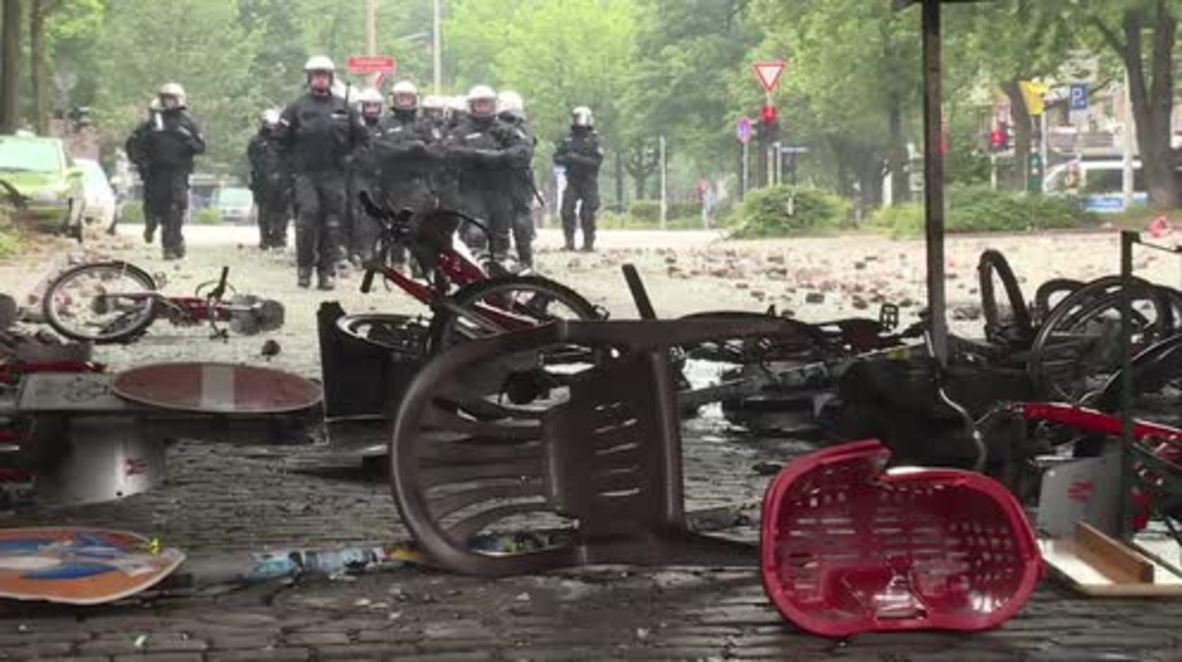 Germany: Hamburg wakes up to gutted shops and burnt-out barricades after night of clashes