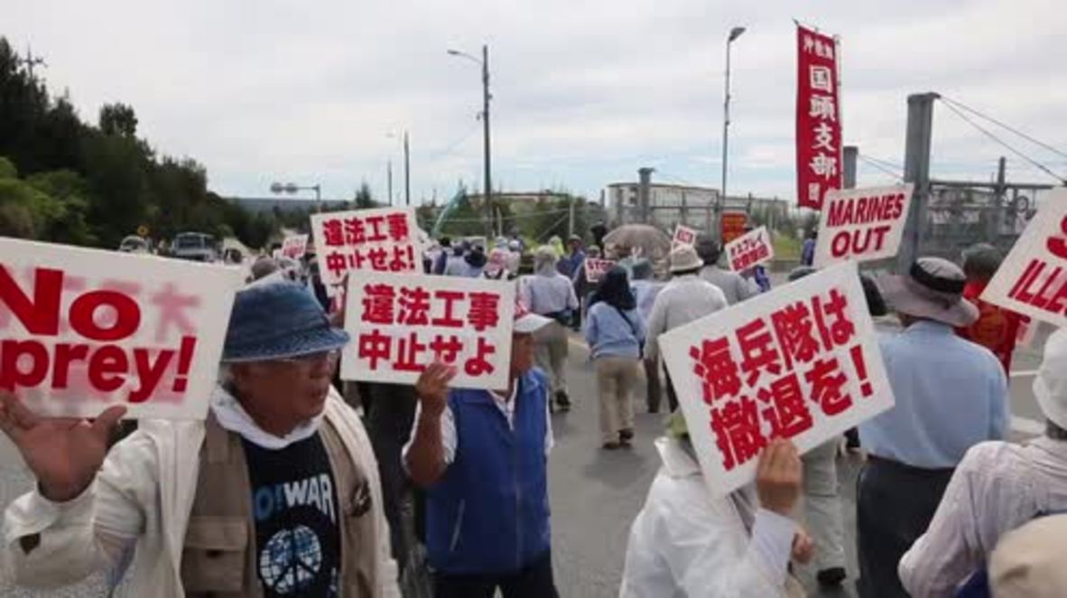 Japan: 'Marines out!' Protesters picket US military base over relocation project