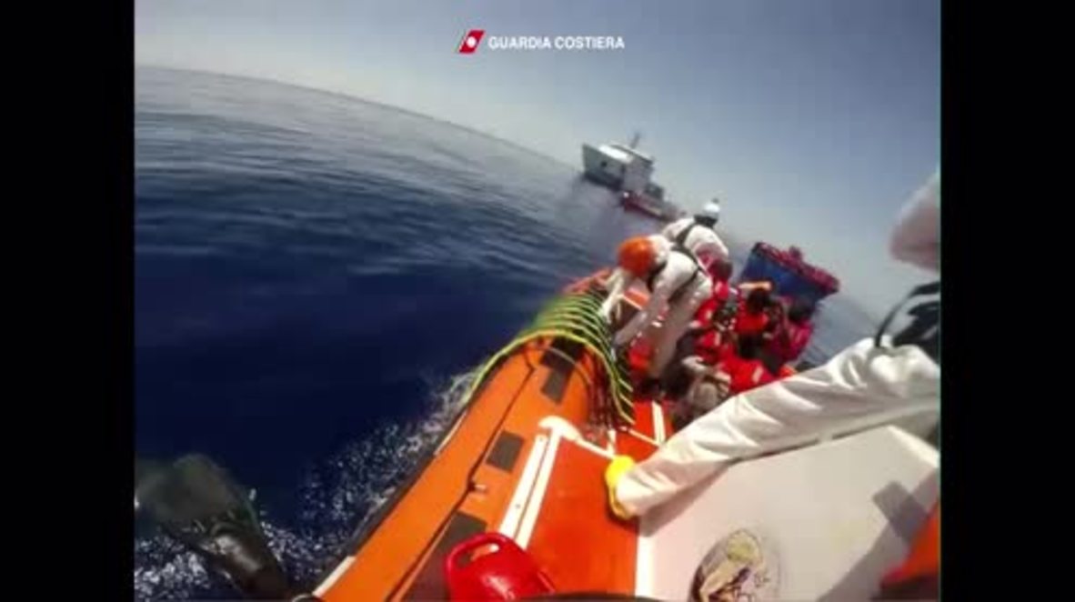 Italy: Coast Guard rescues drowning migrants from Mediterranean Sea