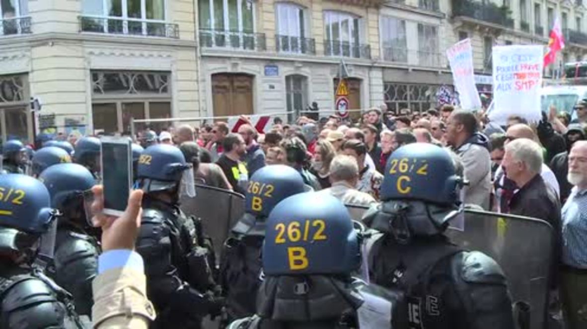 France: Parisians protest against Trump and Macron in Bastille Day march