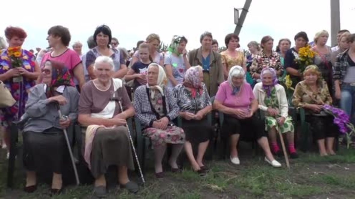 Ukraine: ‘It was a terrible day, which we will never forget’ – mourner on MH17 anniversary