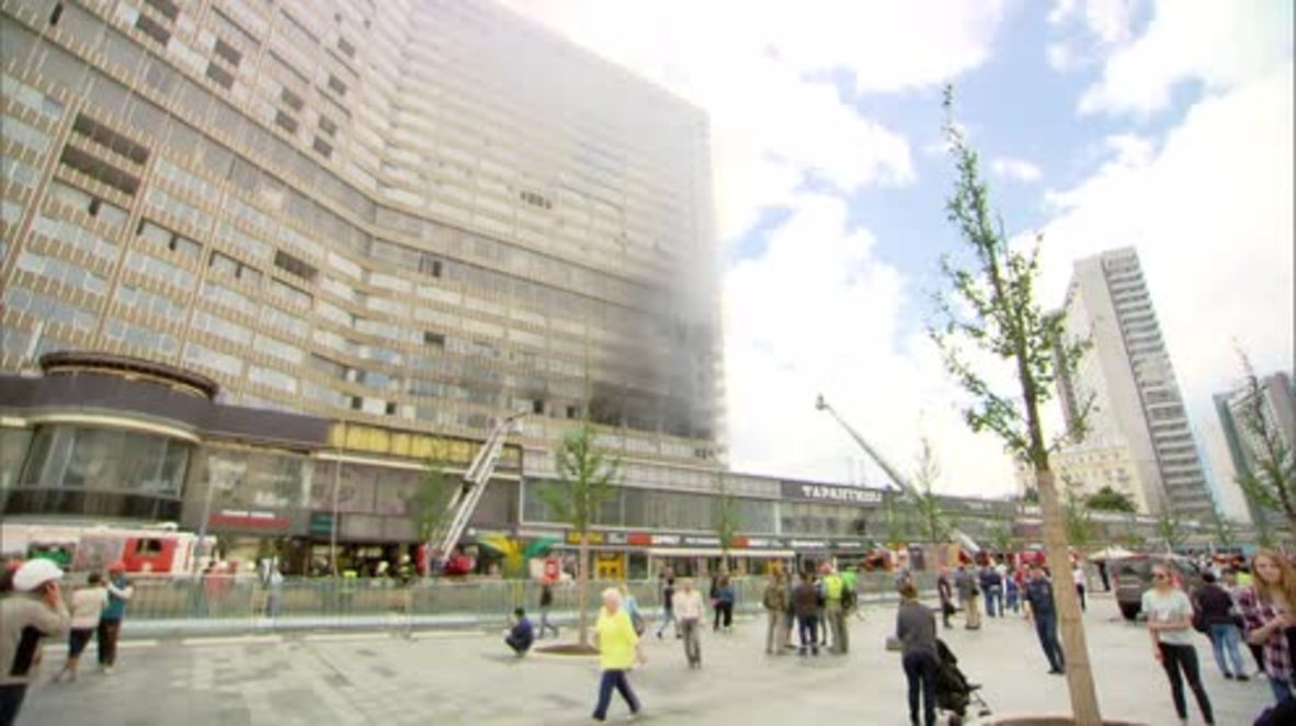 Russia: Firefighters extinguish blaze at 'Book Building' high-rise in Moscow