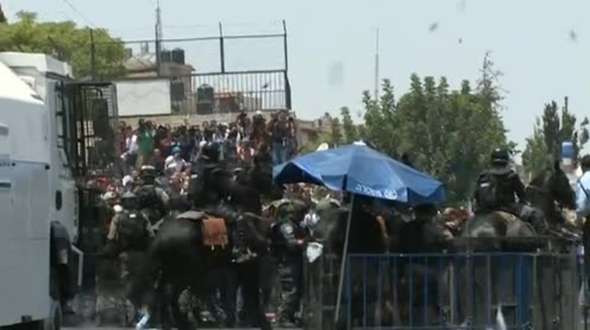East Jerusalem: Palestinians clash with mounted Israeli police over Temple Mount security