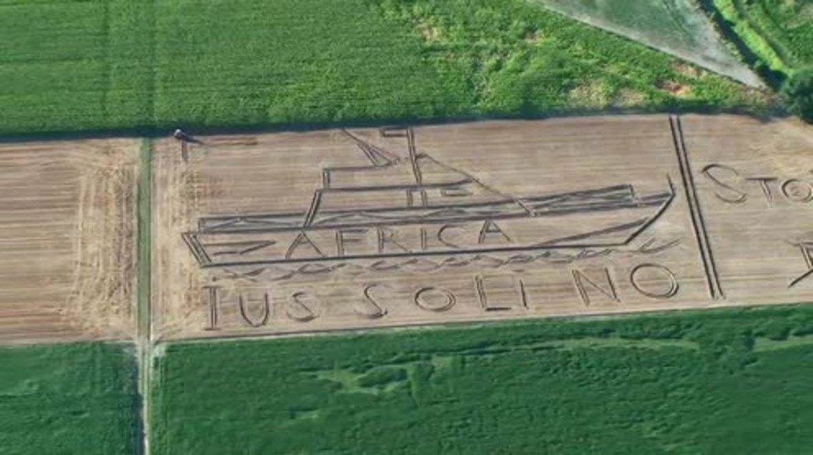 Italy: Anti-migrant crop art appears in field near Verona