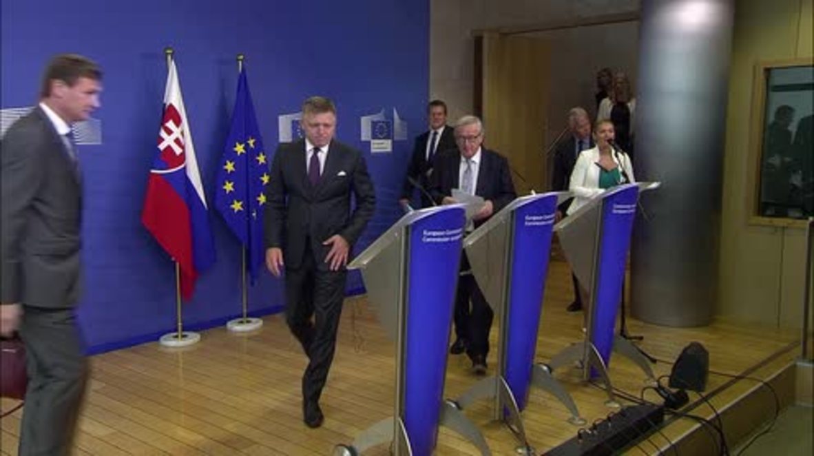 Belgium: Juncker disrupts his own presser with ringing phone, confuses his wife with Merkel