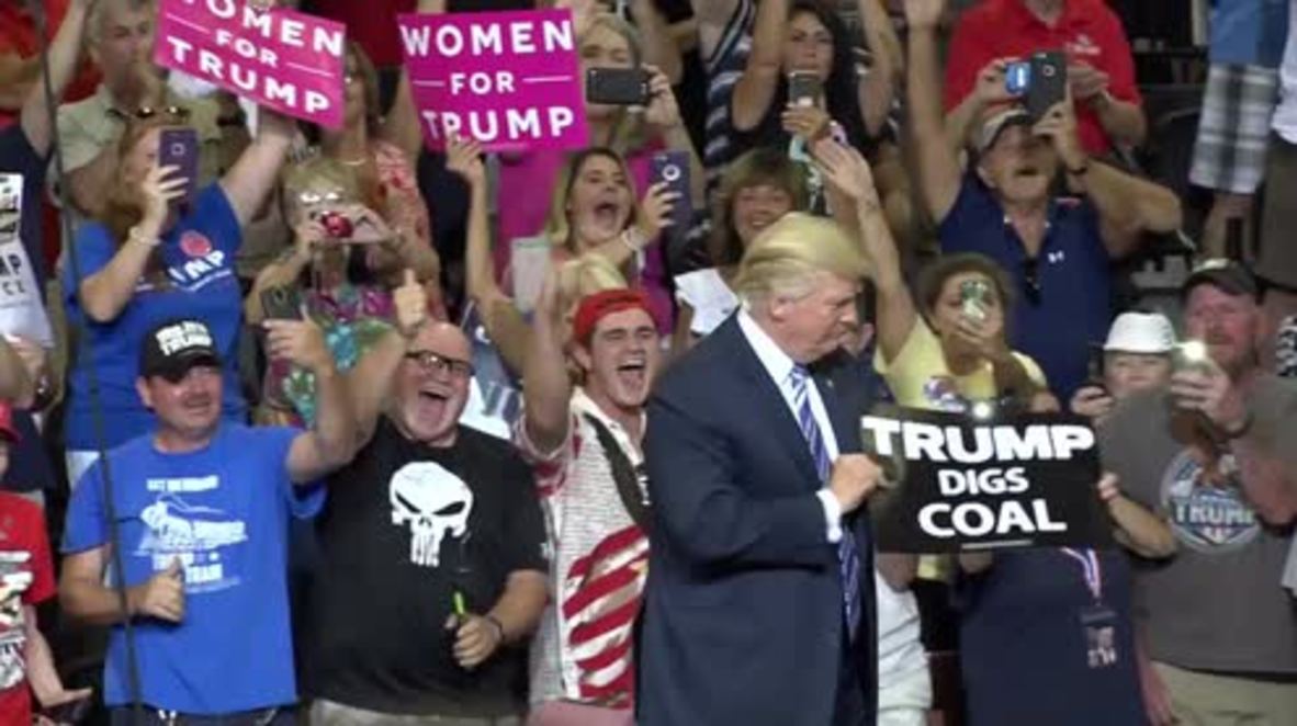 USA: Drama at Trump rally as W. Virginia gov. defects to GOP, protester gets choked