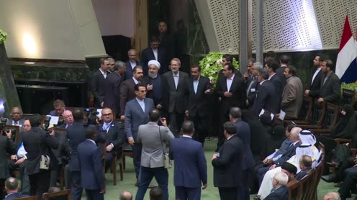 Iran: Rouhani warns US against violating nuclear deal during swearing in ceremony