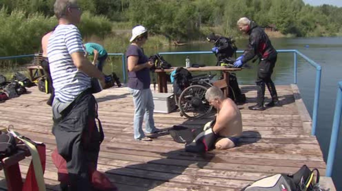 Russian man who lost his arms and legs defies all odds to get diver's license