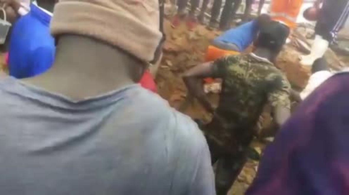 Sierra Leone: Search party dig for victims of devastating mudslide that killed 300