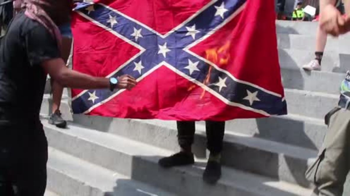 USA: Confederate flag burnt as protesters confront 'Free Speech' rally in Boston
