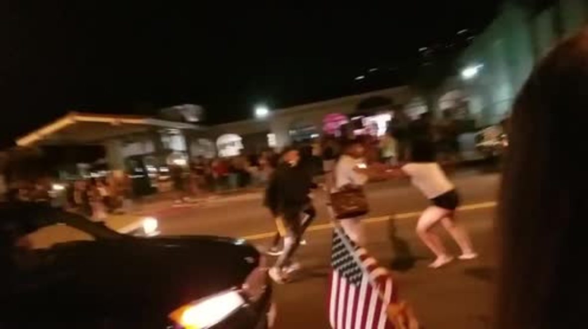 USA: Scuffles as 'America First' rally outnumbered by counter-protest in Laguna Beach