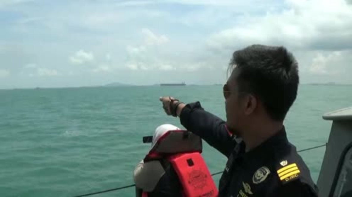 Indonesia: 'Some remains' of 10 missing sailors found following USS McCain collision