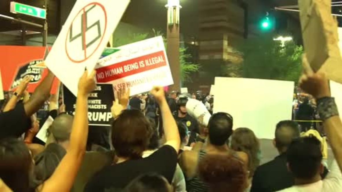 USA: Tensions erupt as pro and anti-Trump protesters face off after President's rally
