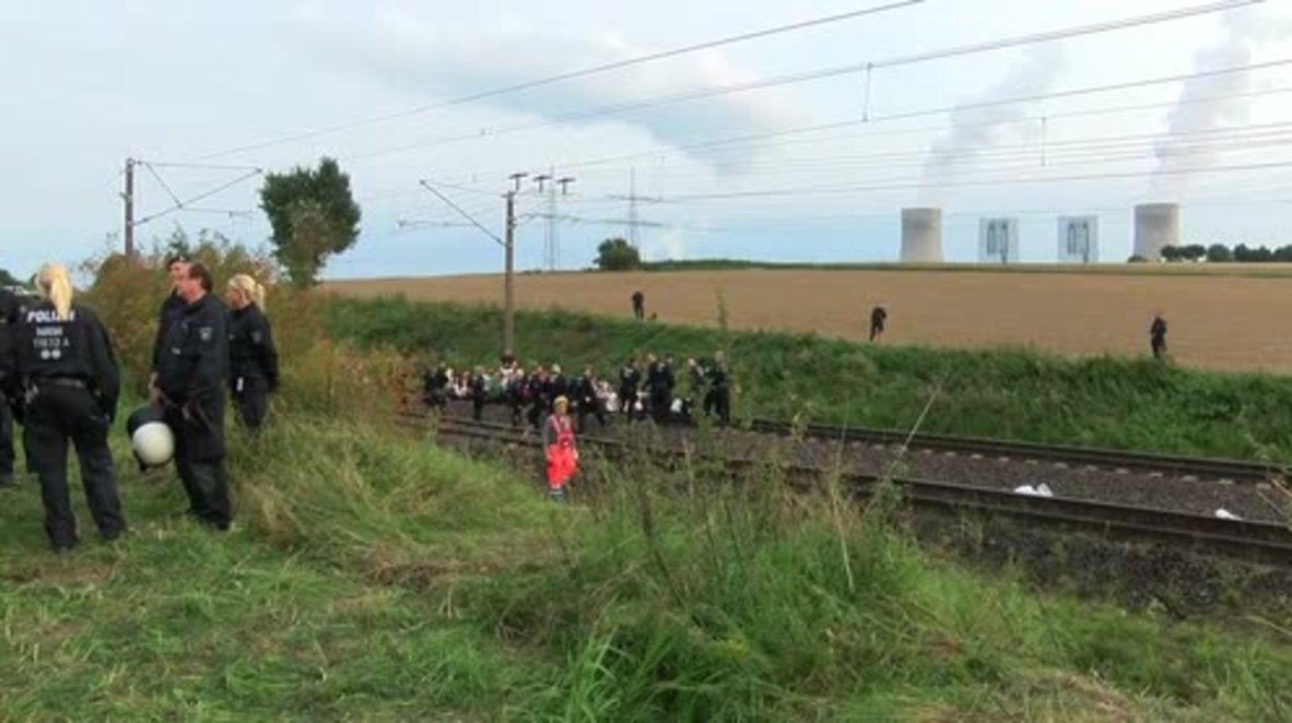 Germany: Anti-lignite protesters sit on train tracks, interrupting coal station operations