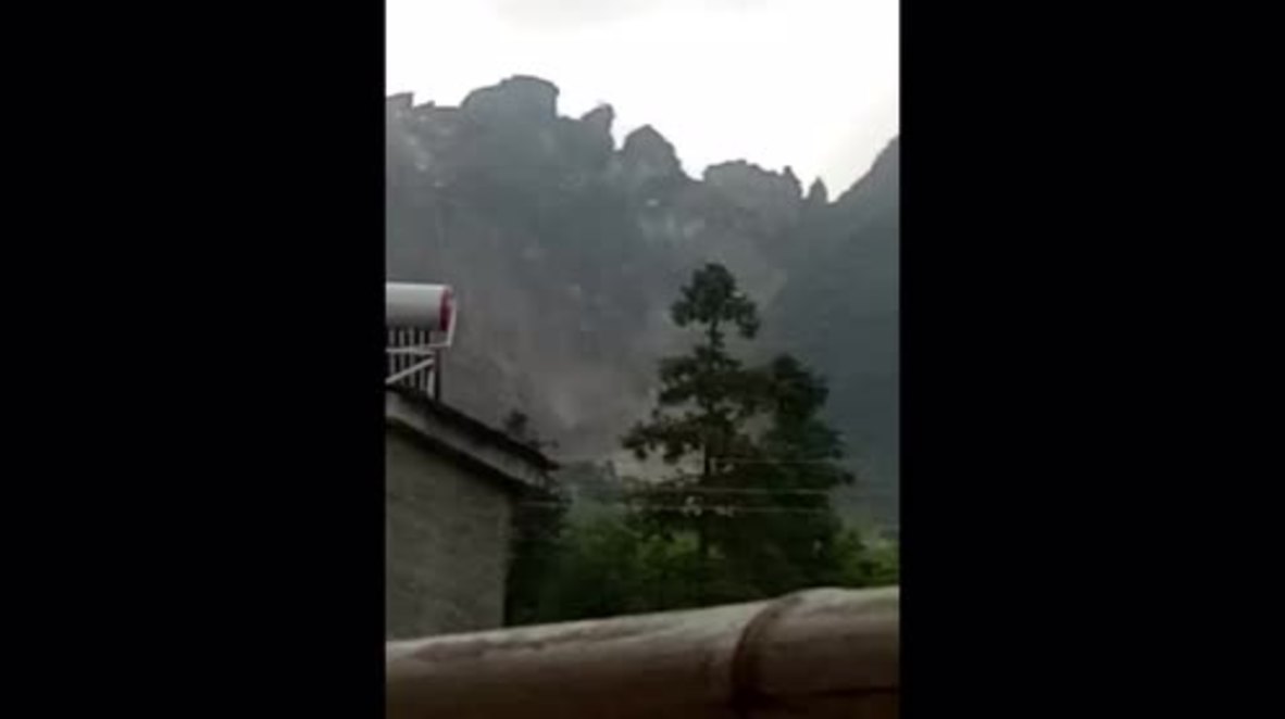China: Landslide kills at least two as mountainside collapses