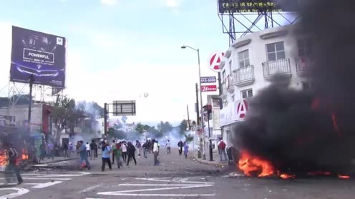 Mexico: Protesters set vehicles alight and police deploy tear gas at teacher union demo