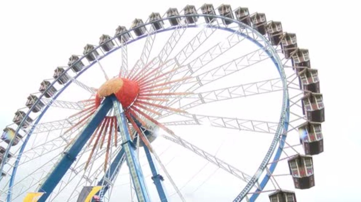 Prost! Thousands of visitors celebrate the start of Oktoberfest