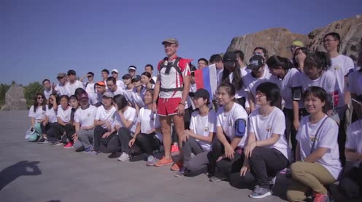 Russia's Forrest Gump arrives in Beijing