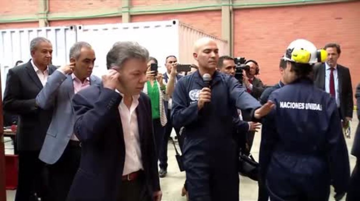 Colombia: President Santos oversees destruction of FARC weaponry