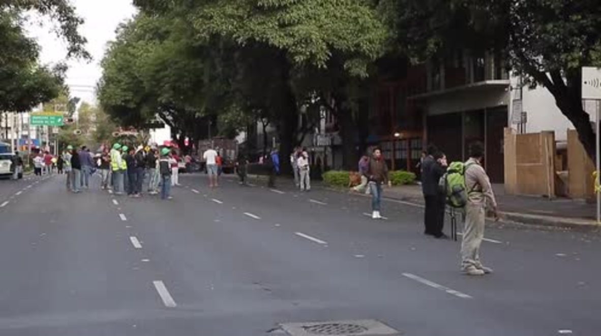 Mexico: Mexico City residents evacuate homes after quake hits Mexico's southern coast