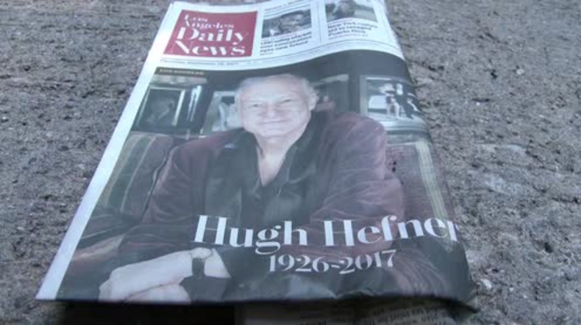 'He must have had a heart of gold' - mourners lay flowers Hefner's Playboy mansion gates