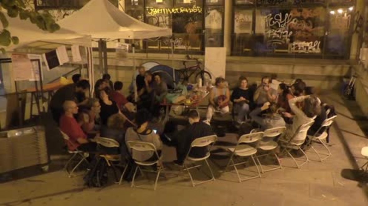 Spain: Barcelona residents camp out polling station to ensure vote