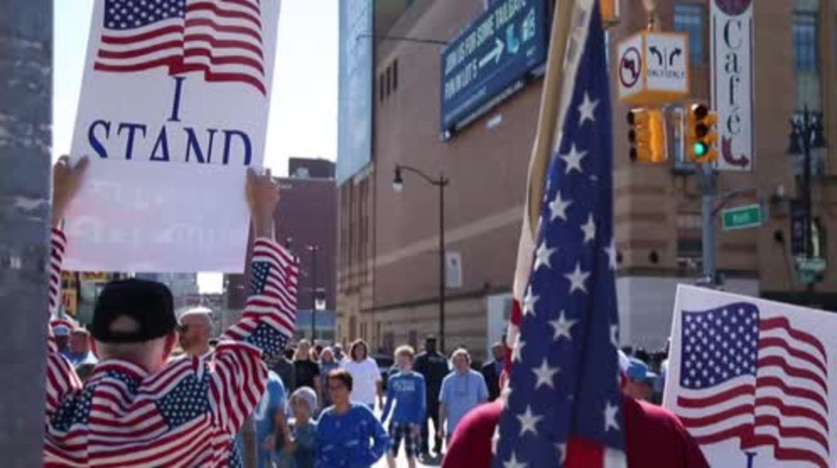 USA: Demos for and against NFL players' kneeling protest meet in Detroit
