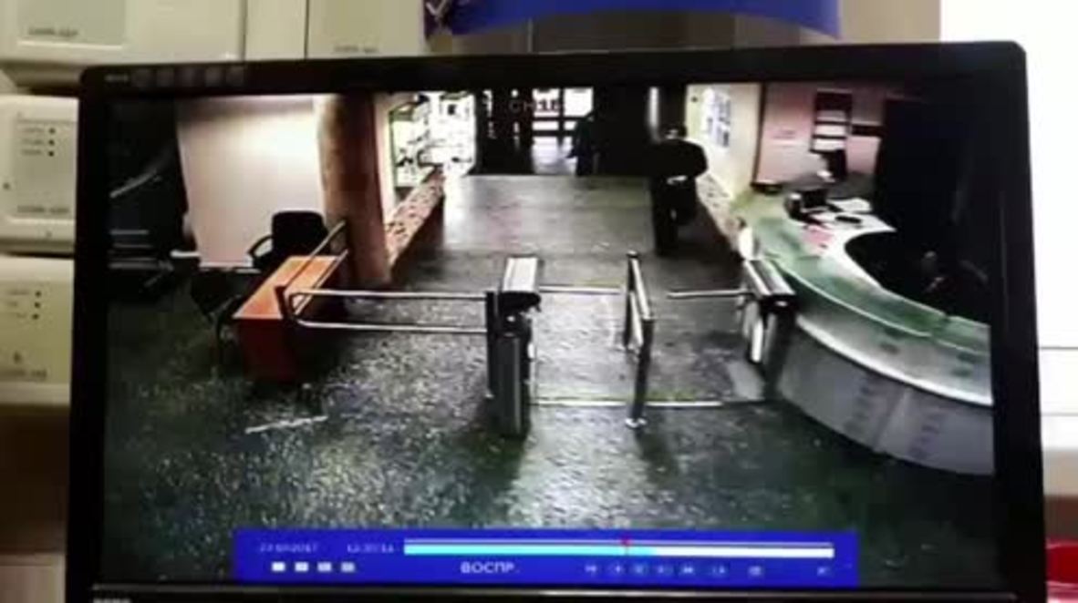 Russia: CCTV captures journalist's attacker forcing entry at radio station before stabbing