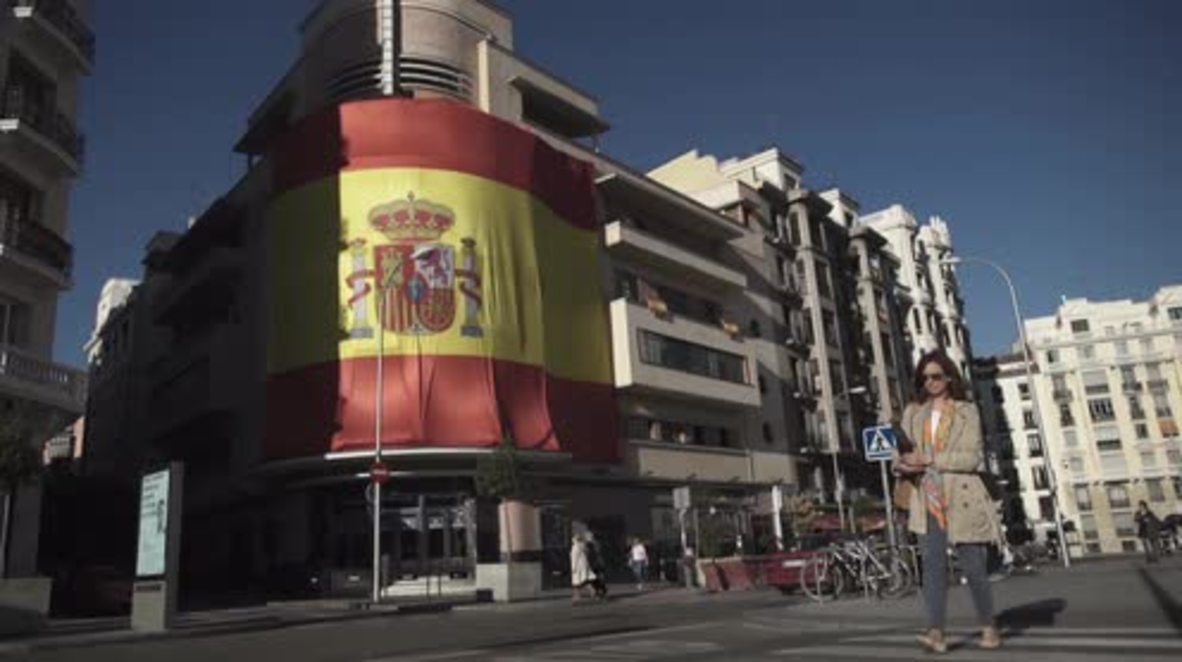 Spain: Massive Spanish flag covers iconic Madrid nightclub