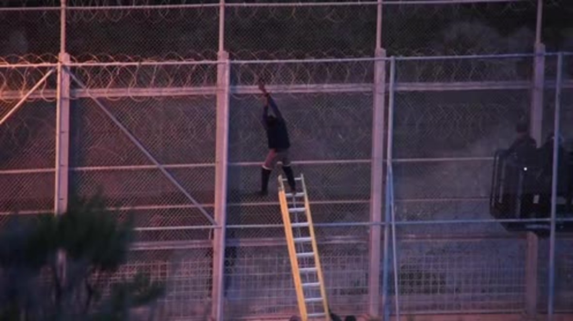 Spain: Border guards expel migrants after failed attempt to scale fence into Ceuta