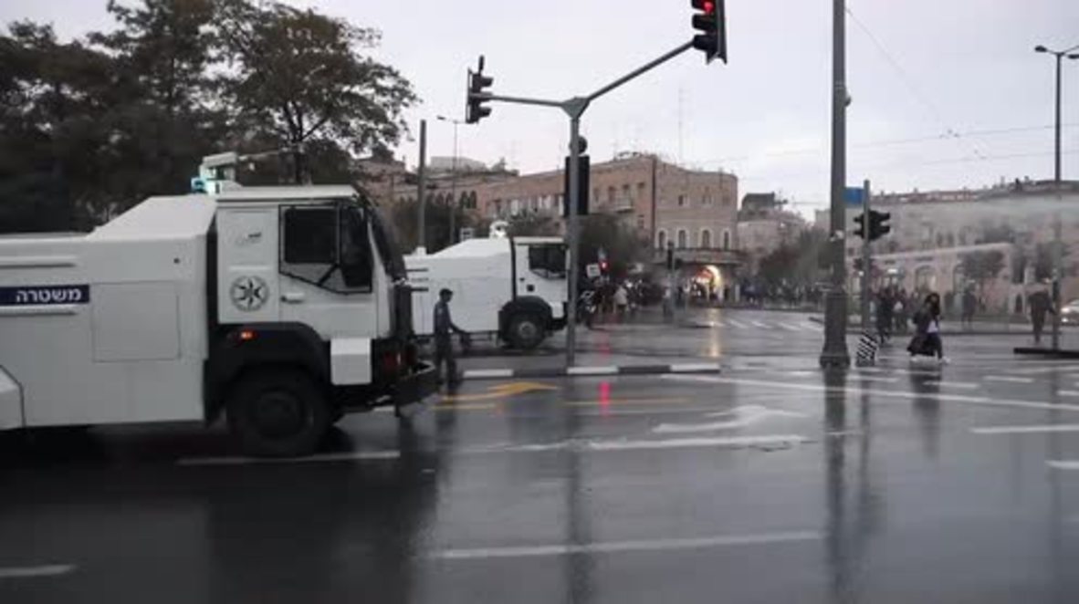Israel: Female passer-by sent flying by police skunk-water cannon