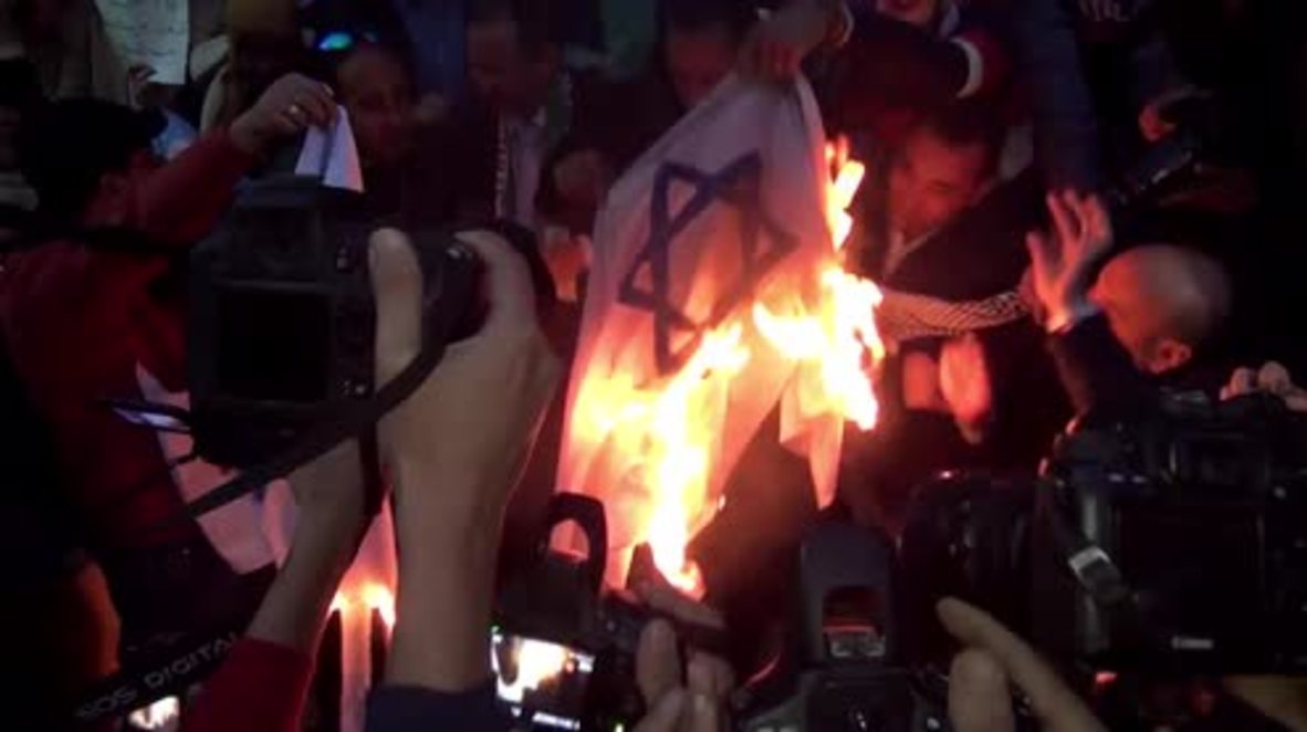 Egypt: Arrests made as demonstrators burn Israeli flags in furious protest