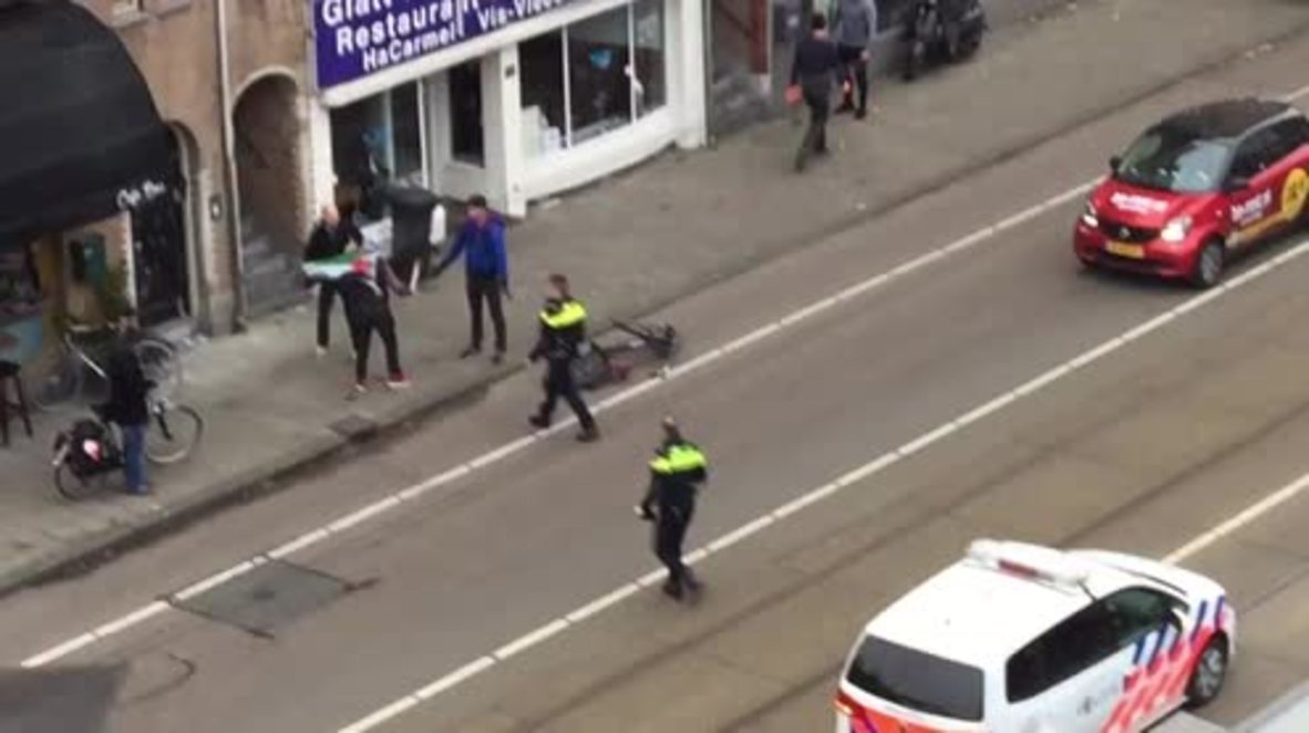 Netherlands: Man with Palestinian flag smashes windows of Kosher restaurant in Amsterdam