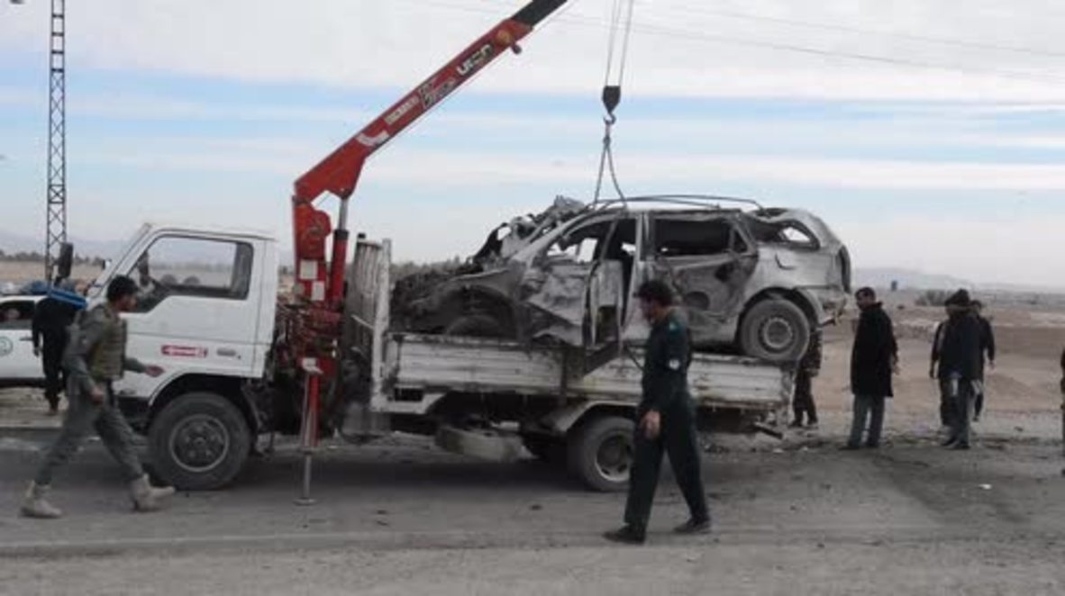 Afghanistan: Investigators attend scene of car bomb attack on NATO convoy