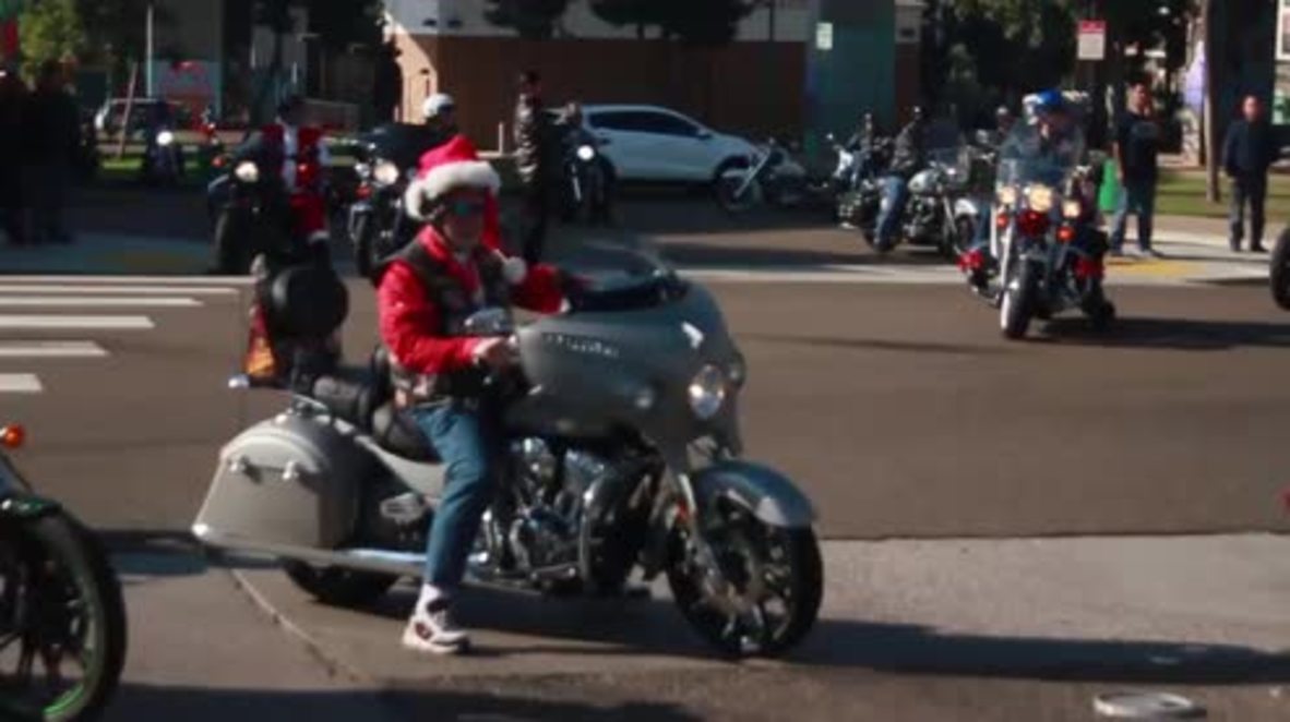 Mexico: Santa bikers roar into Tijuana armed with toys