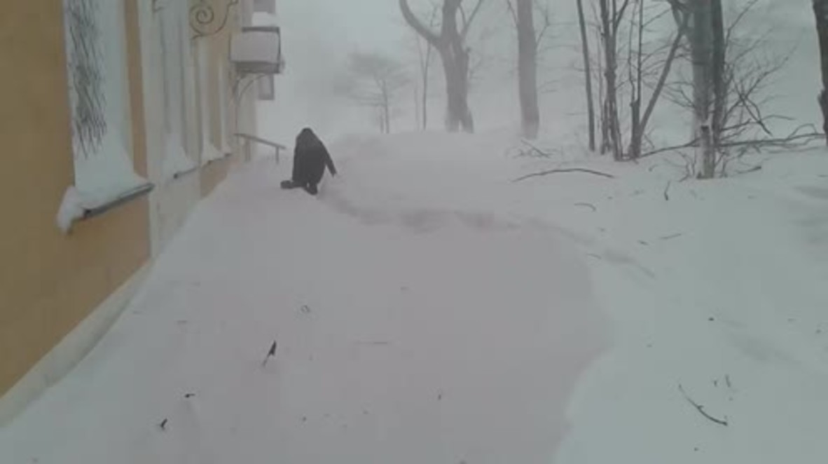 Dashing through the snow! - Woman braves blizzard in Sakhalin