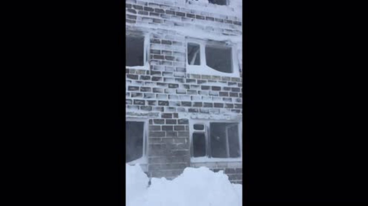 SNOW much fun! Sakhalin locals leap from top floor into snow piles