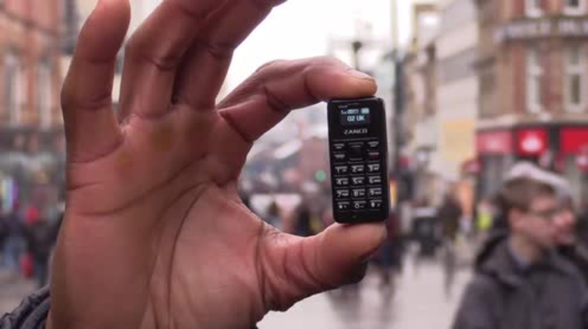 World's smallest mobile phone is size of a human THUMB