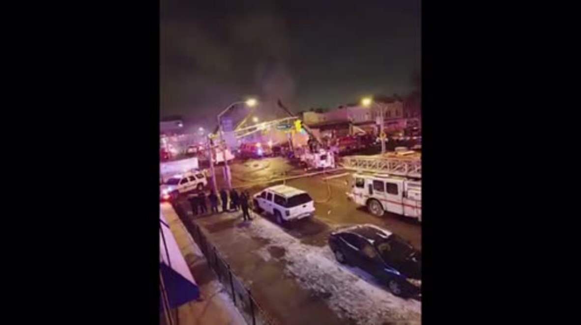 USA: Firefighters tackle flames at tire shop in Newark