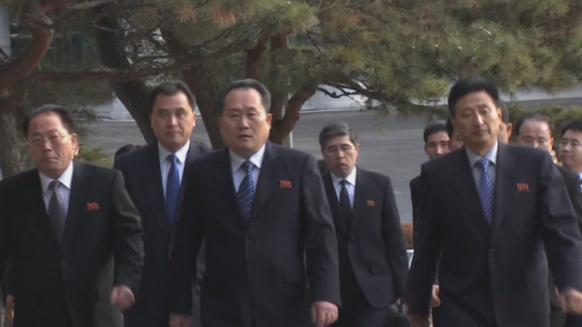 North/South Korea: Delegates arrive for talks at truce village