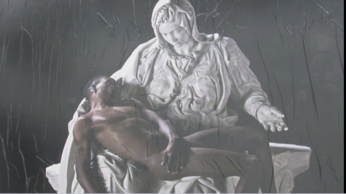 Italy: Virgin Mary cradling black refugee ‘Jesus’ stuns Milan