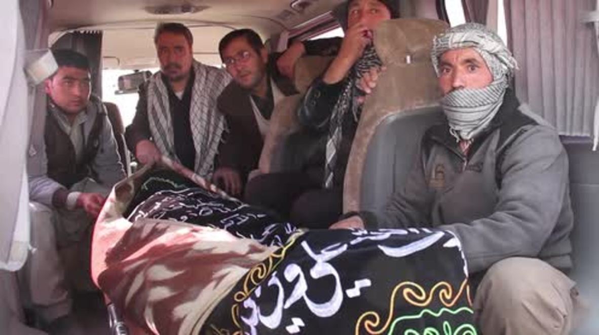 Afghanistan: Mourners bury victims after over 100 killed in Kabul blast