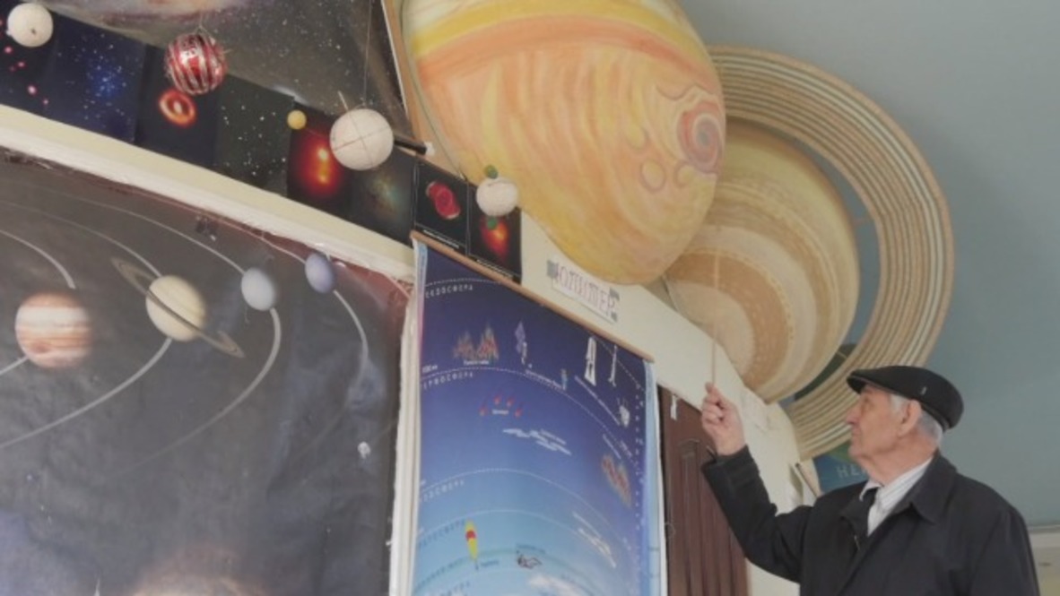 Out-of-this-world Russian pensioner builds his own SOLAR SYSTEM at home!