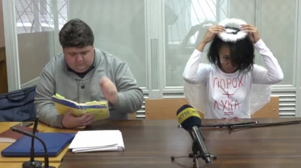 Ukraine: FEMEN activist dresses as cupid for Valentine court hearing
