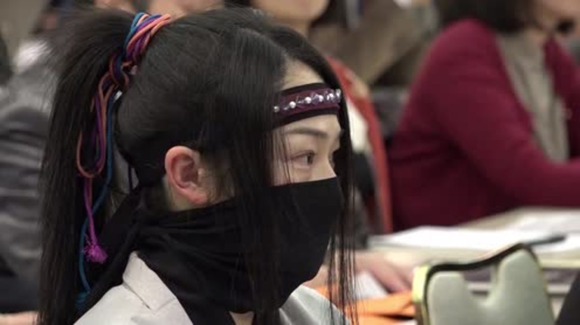 Japan: Ninja students swap swords for studies