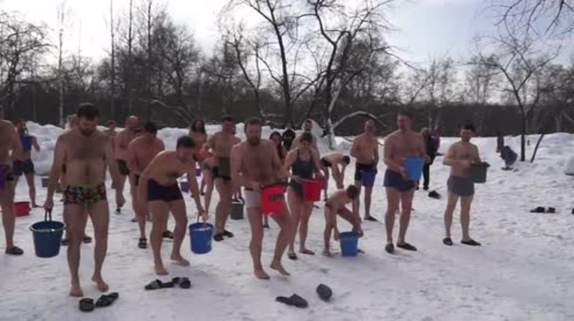 Scantily clad Siberians welcome in spring with ICE buckets